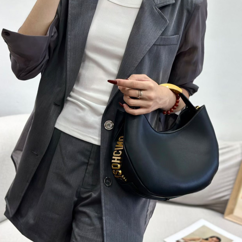 Halvemaanvormige dames handtas - Luxury Bags Online recensie en prijs